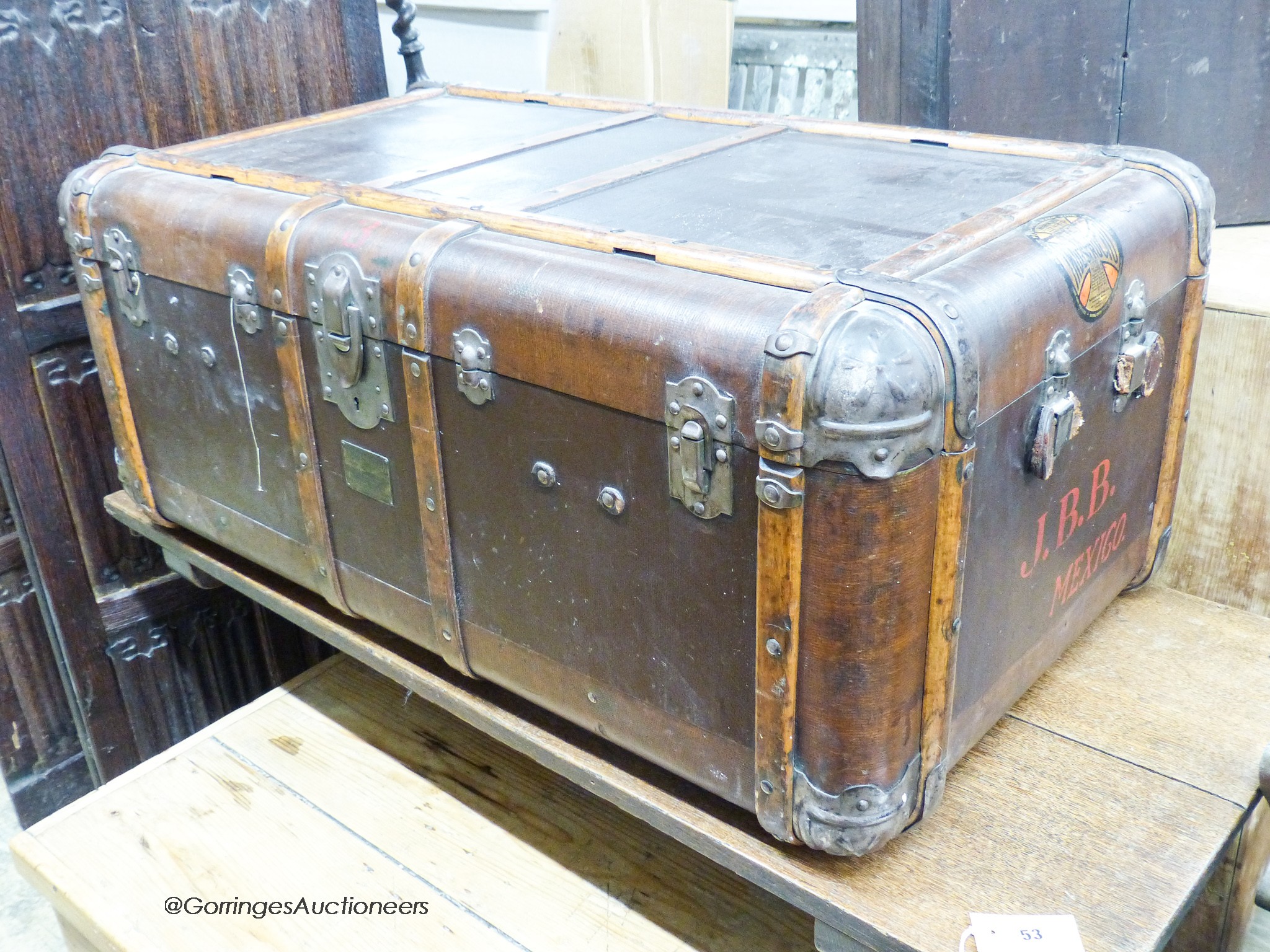 A vintage wood bound travelling trunk, length 102cm, depth 60cm, height 43cm